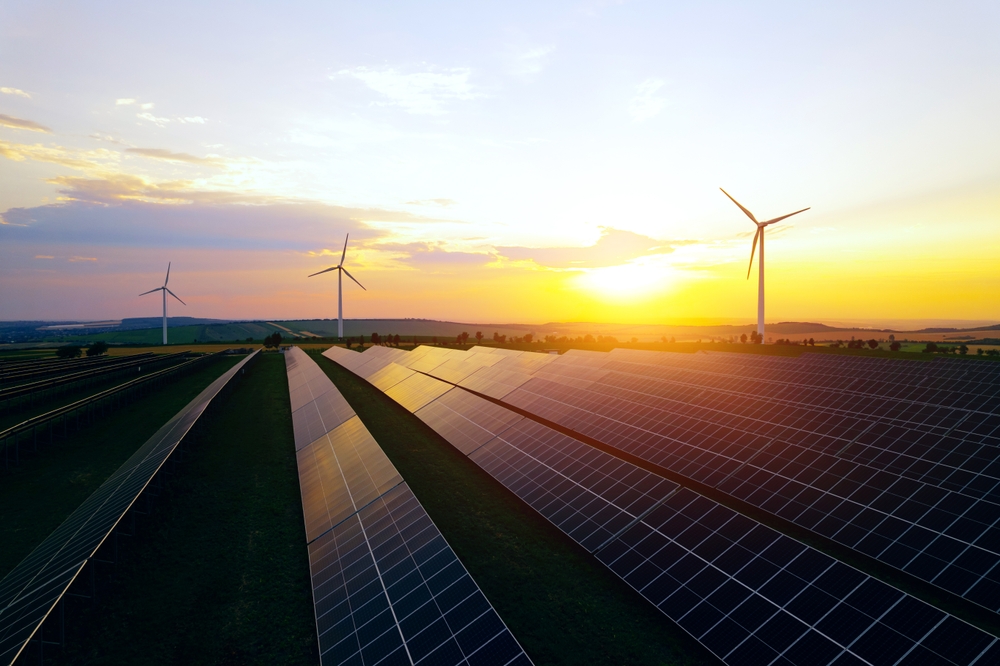 Solar,Panels,Park,And,Wind,Turbines,At,Sunset.wind,Turbines,Generating